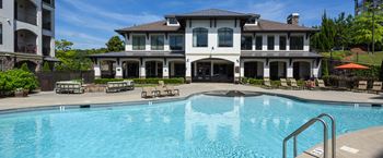 Pool and clubhouse with fireplace at tapestry park, virginia